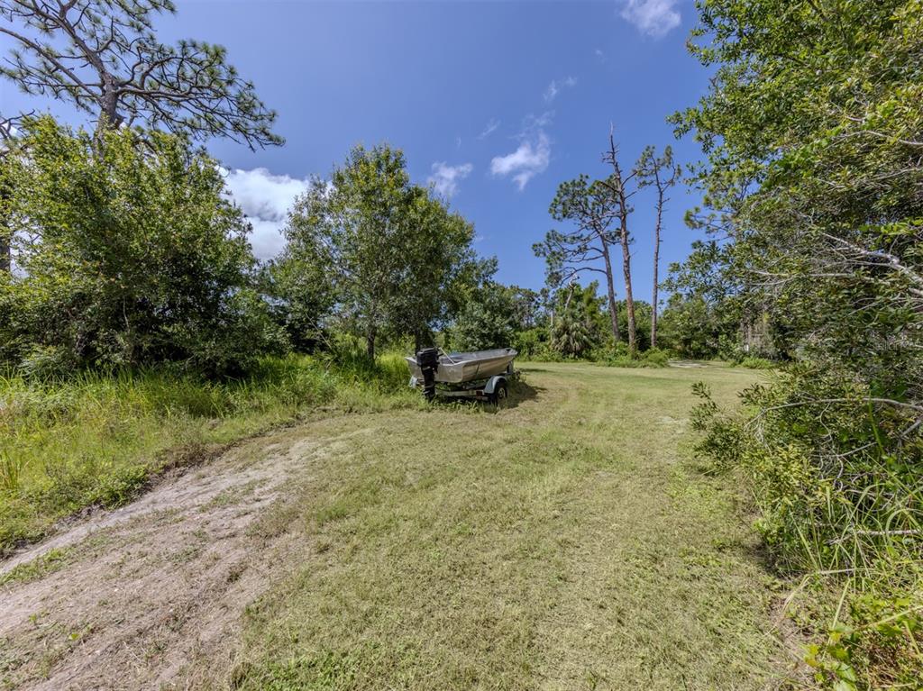 East Manasota Beach Road Englewood, FL 34223 - Photo 17 of 65 a pathway to a yard