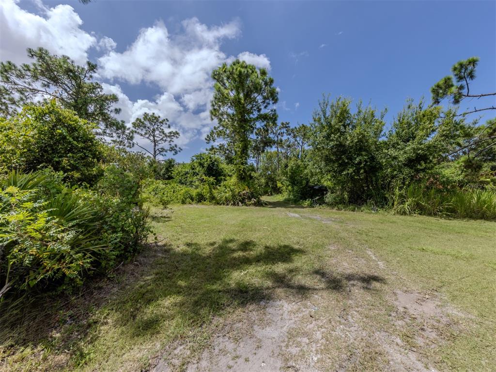 East Manasota Beach Road Englewood, FL 34223 - Photo 18 of 65 a view of a yard