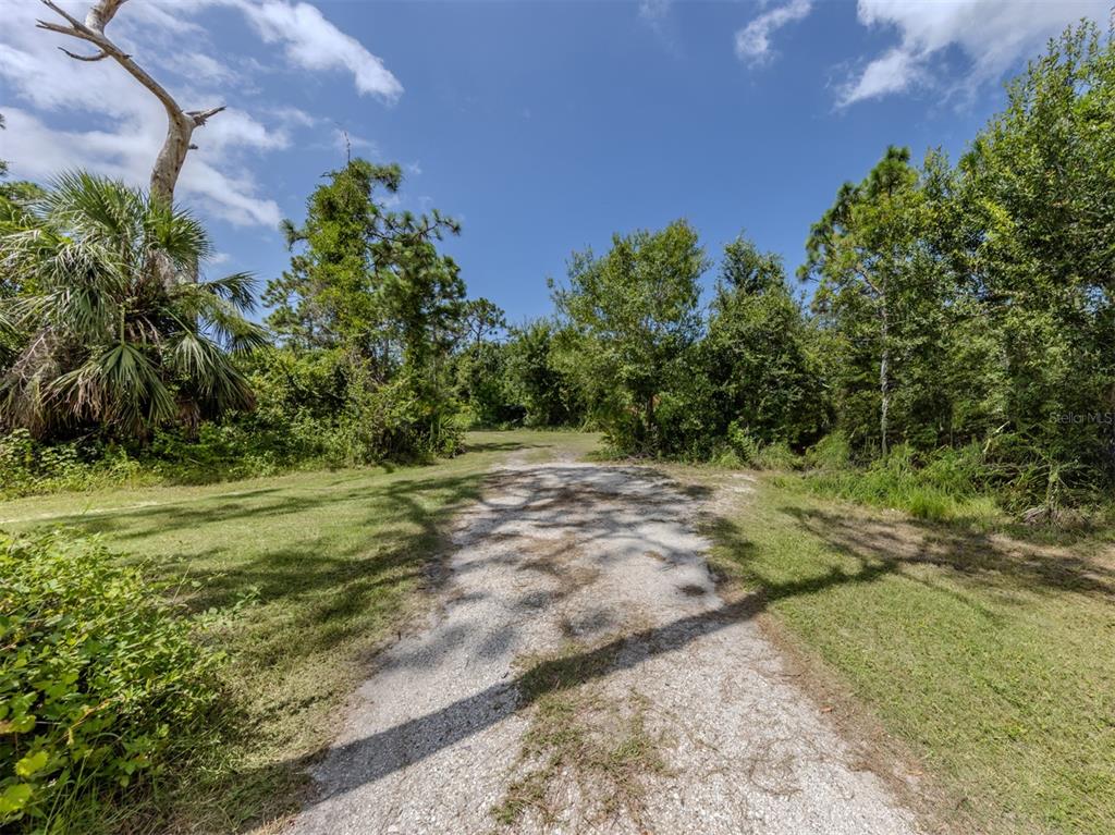 East Manasota Beach Road Englewood, FL 34223 - Photo 20 of 65 a view of a field with trees