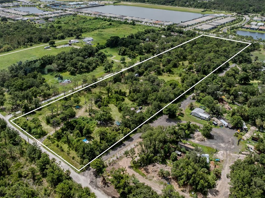 East Manasota Beach Road Englewood, FL 34223 - Photo 31 of 65 a aerial view of a residential houses
