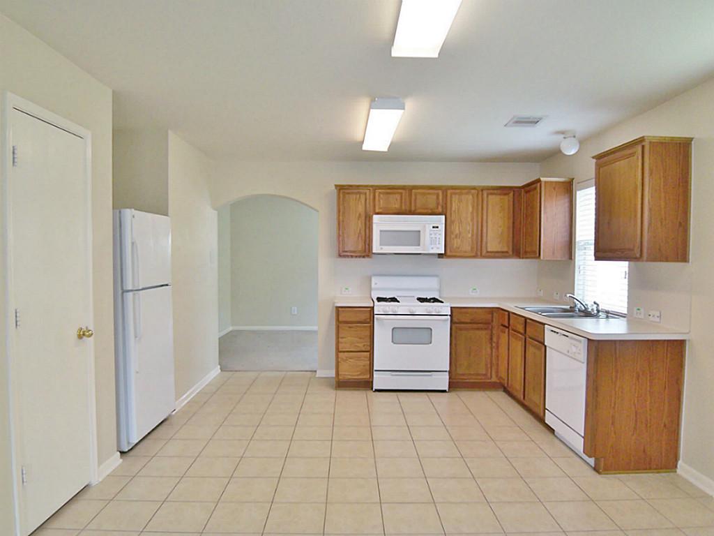 7335 Kransburg Ranch Drive Cypress, TX 77433 - Photo 6 of 21 Spacious Kitchen & Dining area combined. Refrigerator is available for an additional rent