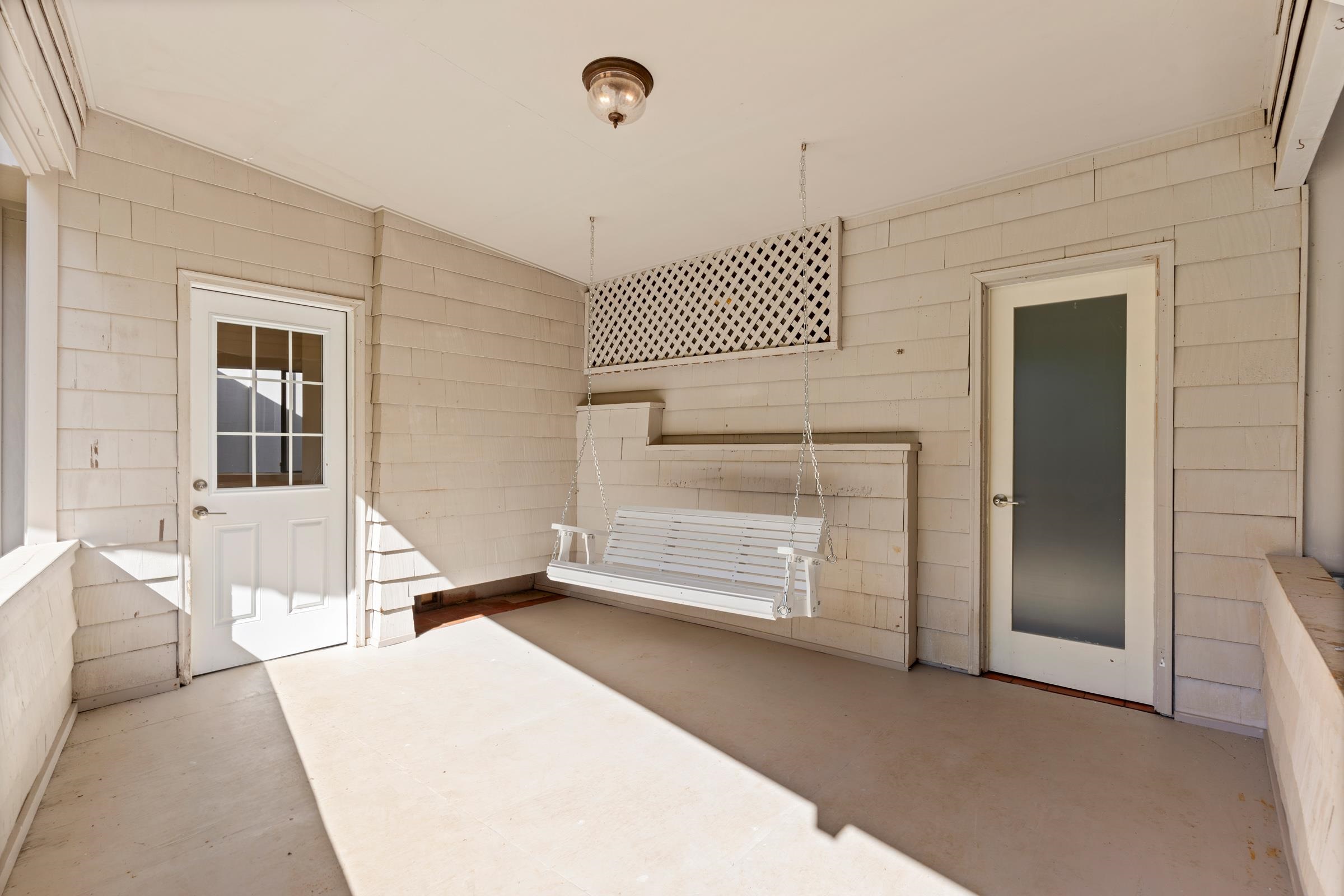 575 Awalau Road Haiku, HI 96708 - Photo 30 of 50 a room with a bed and a night stand