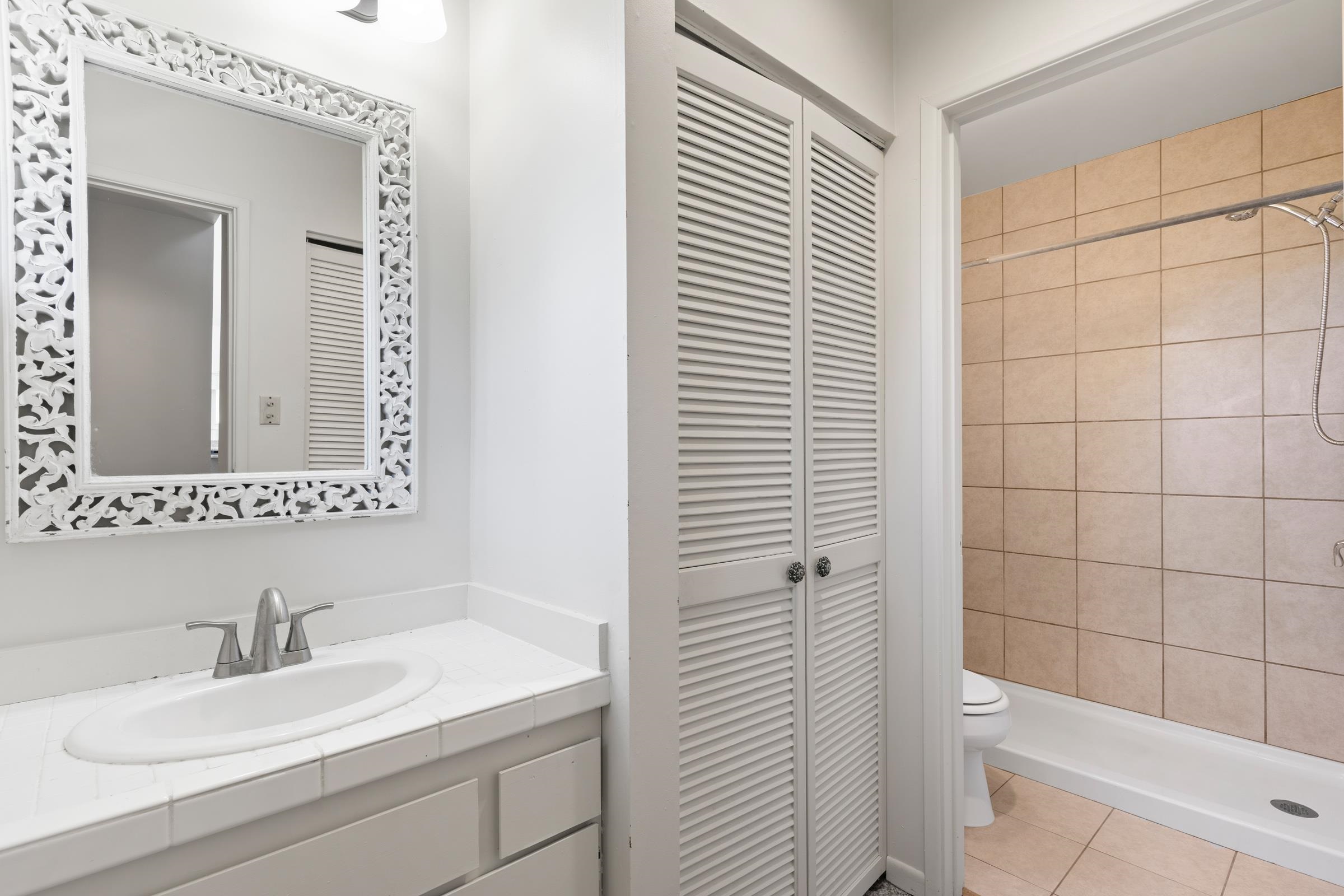 575 Awalau Road Haiku, HI 96708 - Photo 35 of 50 a bathroom with a sink a toilet and shower