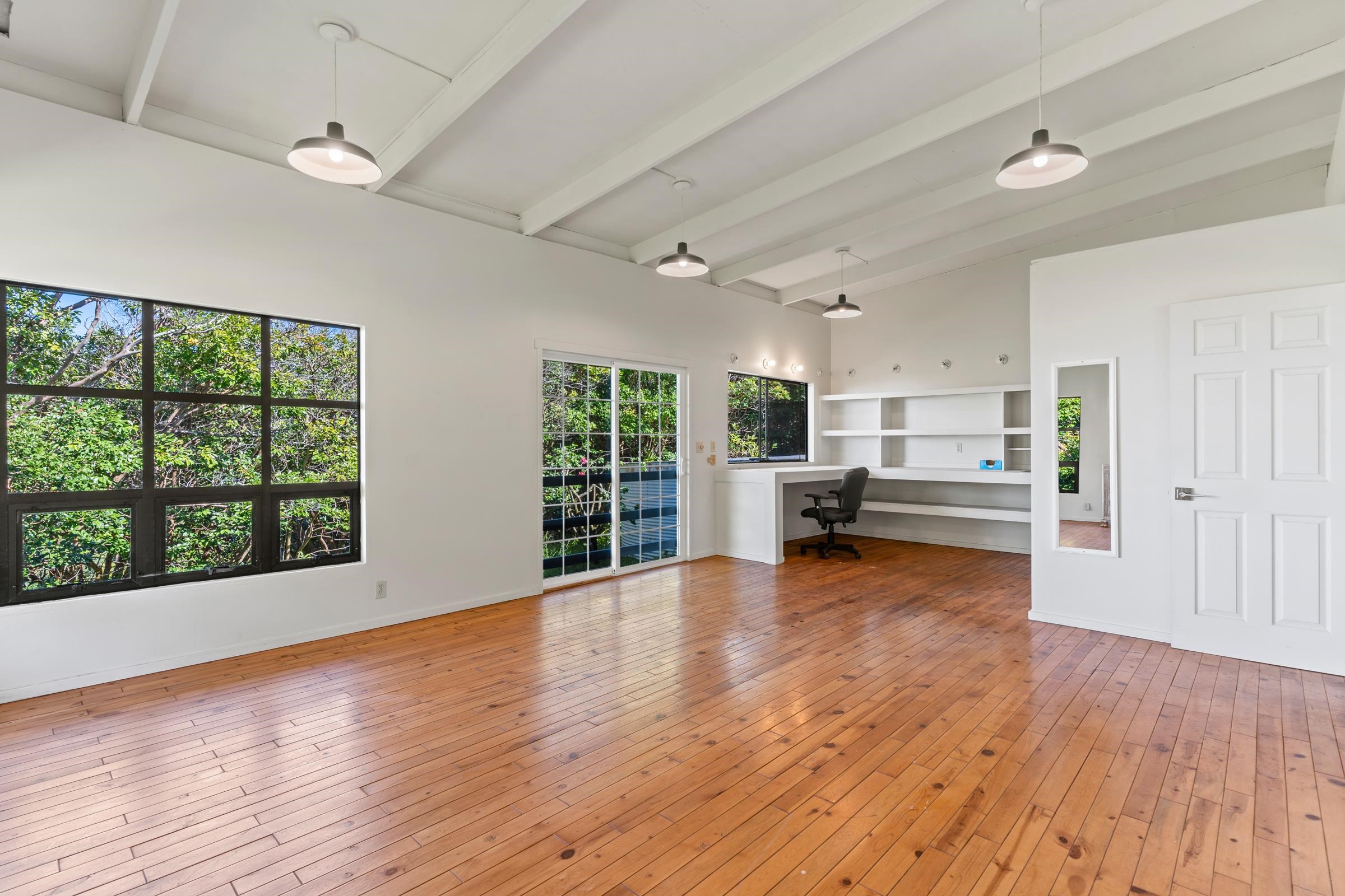 575 Awalau Road Haiku, HI 96708 - Photo 6 of 50 a view of livingroom with hardwood floor and window