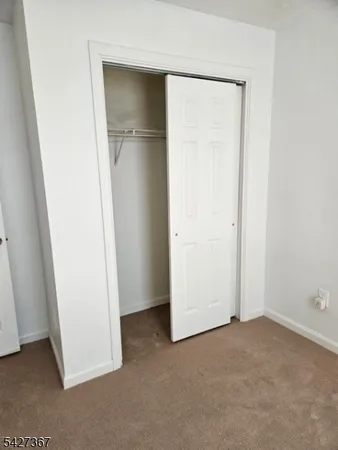 an empty room with closet