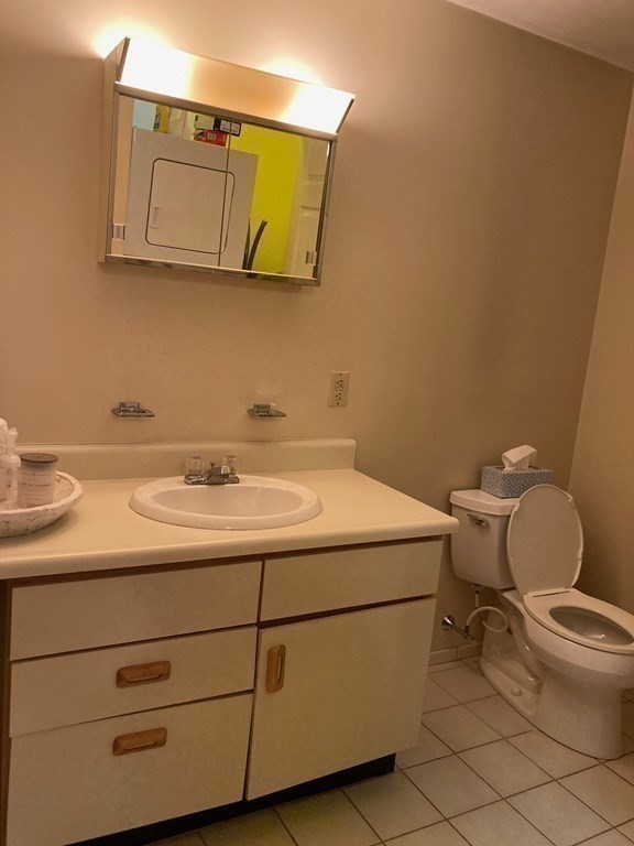 72 School Street, Unit 5 Everett, MA 02149 - Photo 18 of 21 a utility room with dryer and washer