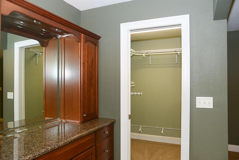 7 Elkwood Court Shalimar, FL 32579 - Photo 13 of 23 a bathroom with a granite countertop sink and a mirror