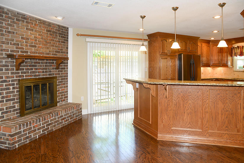 7 Elkwood Court Shalimar, FL 32579 - Photo 5 of 23 a view of a kitchen with a sink and wooden floor