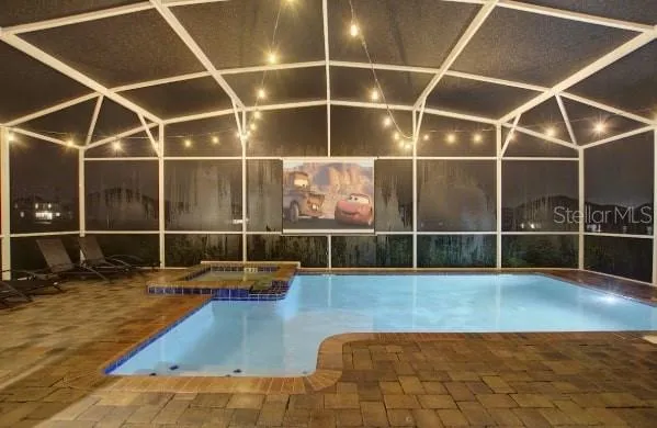 a view of a gym with wooden floor