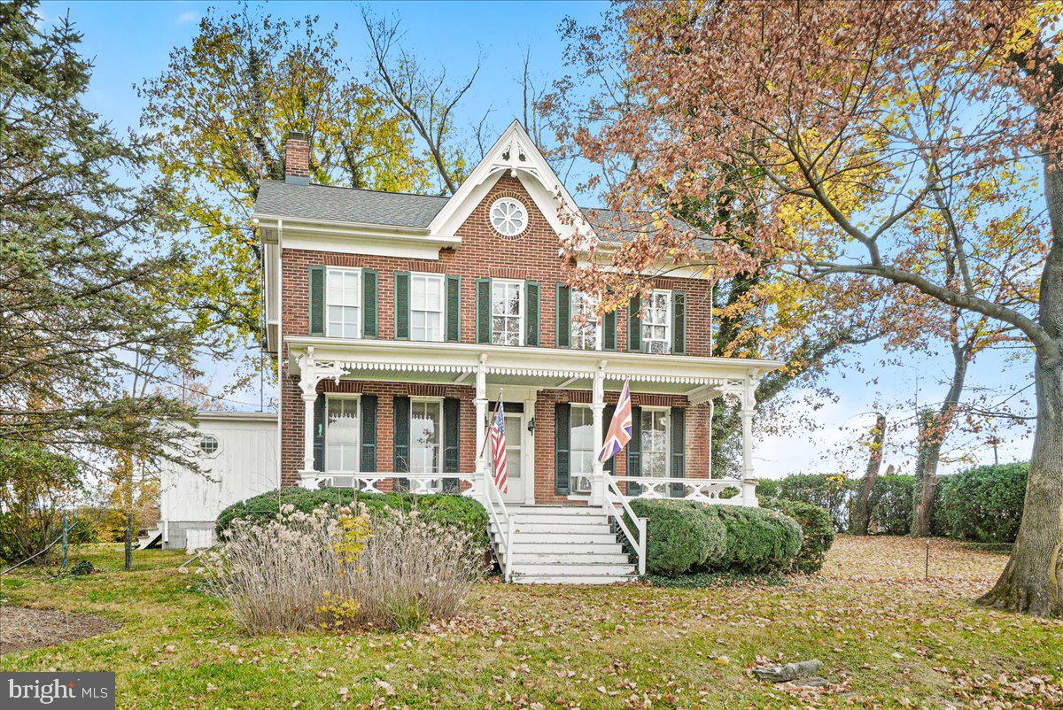 431 Mckinstrys Mill Road Union Bridge, MD 21791 - Photo 2 of 99 a front view of a house with garden