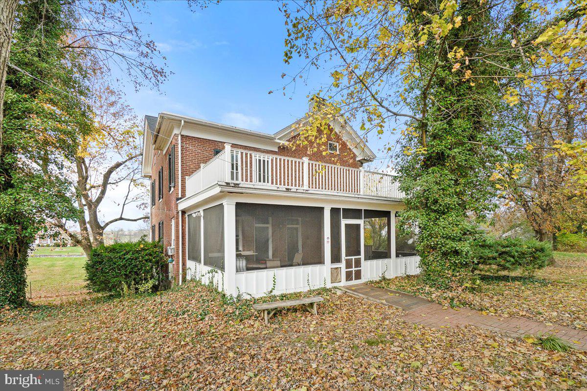 431 Mckinstrys Mill Road Union Bridge, MD 21791 - Photo 3 of 99 a front view of a house with a garden