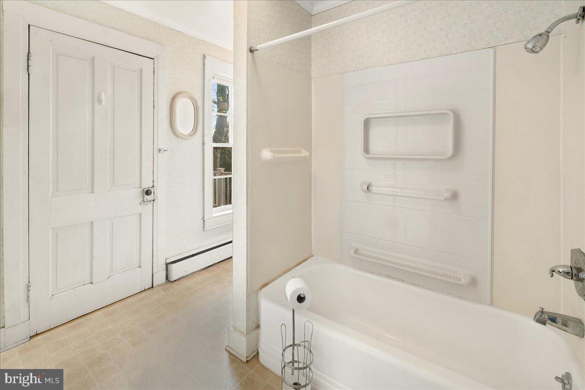 431 Mckinstrys Mill Road Union Bridge, MD 21791 - Photo 34 of 99 a bathroom with a bathtub and a shower
