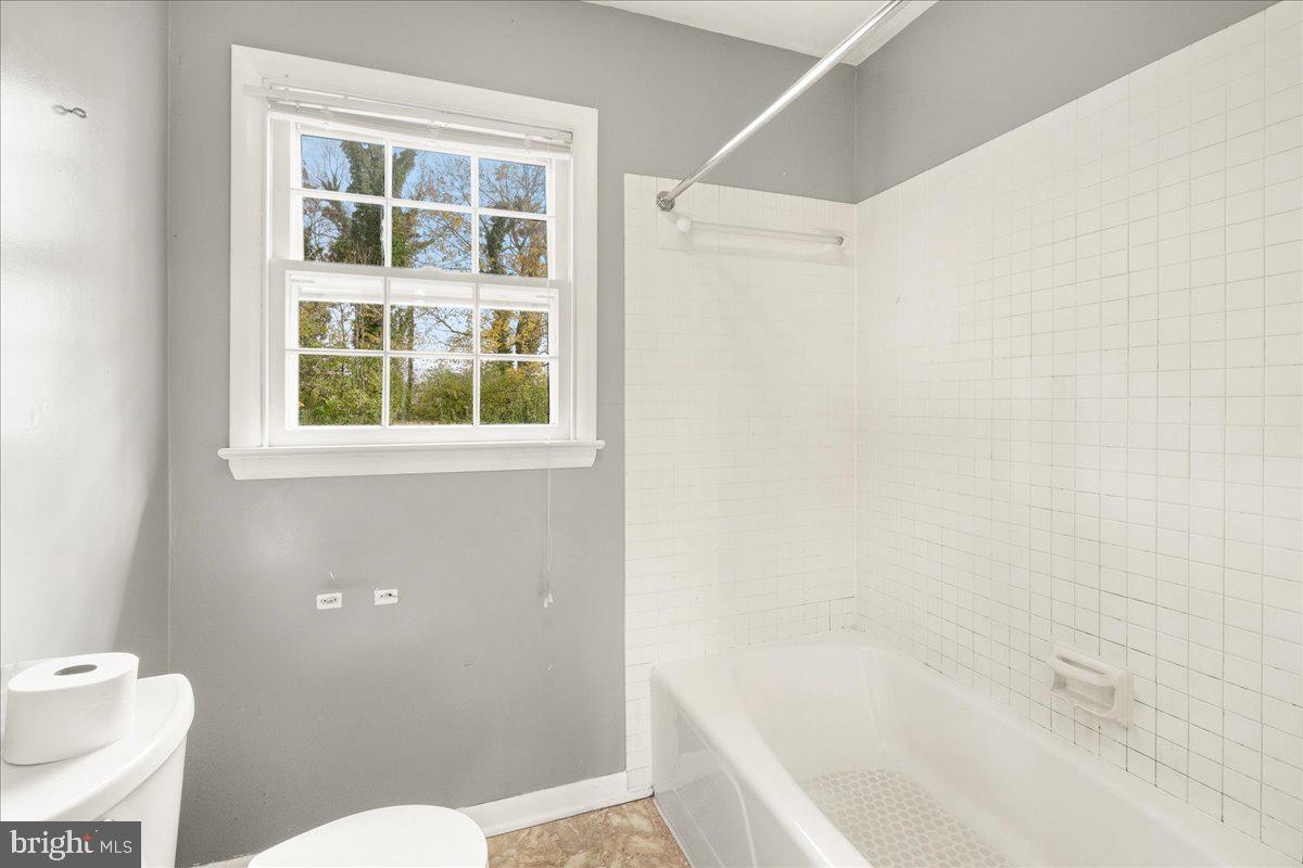 431 Mckinstrys Mill Road Union Bridge, MD 21791 - Photo 54 of 99 a bathroom with a bathtub and a toilet