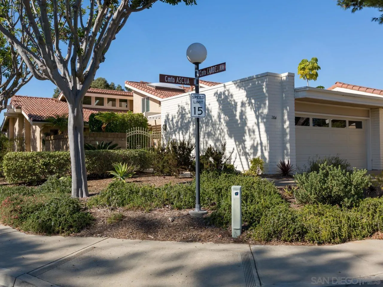 1804 Caminito Ascua La Jolla, CA 92037 - Photo 1 of 20 a front view of a house with a garden