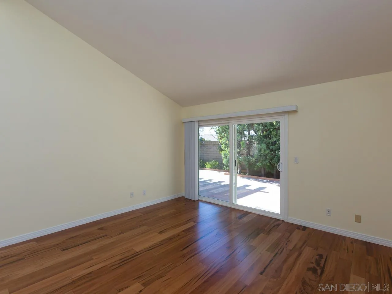 1804 Caminito Ascua La Jolla, CA 92037 - Photo 15 of 20 a view of wooden floor and windows in a room