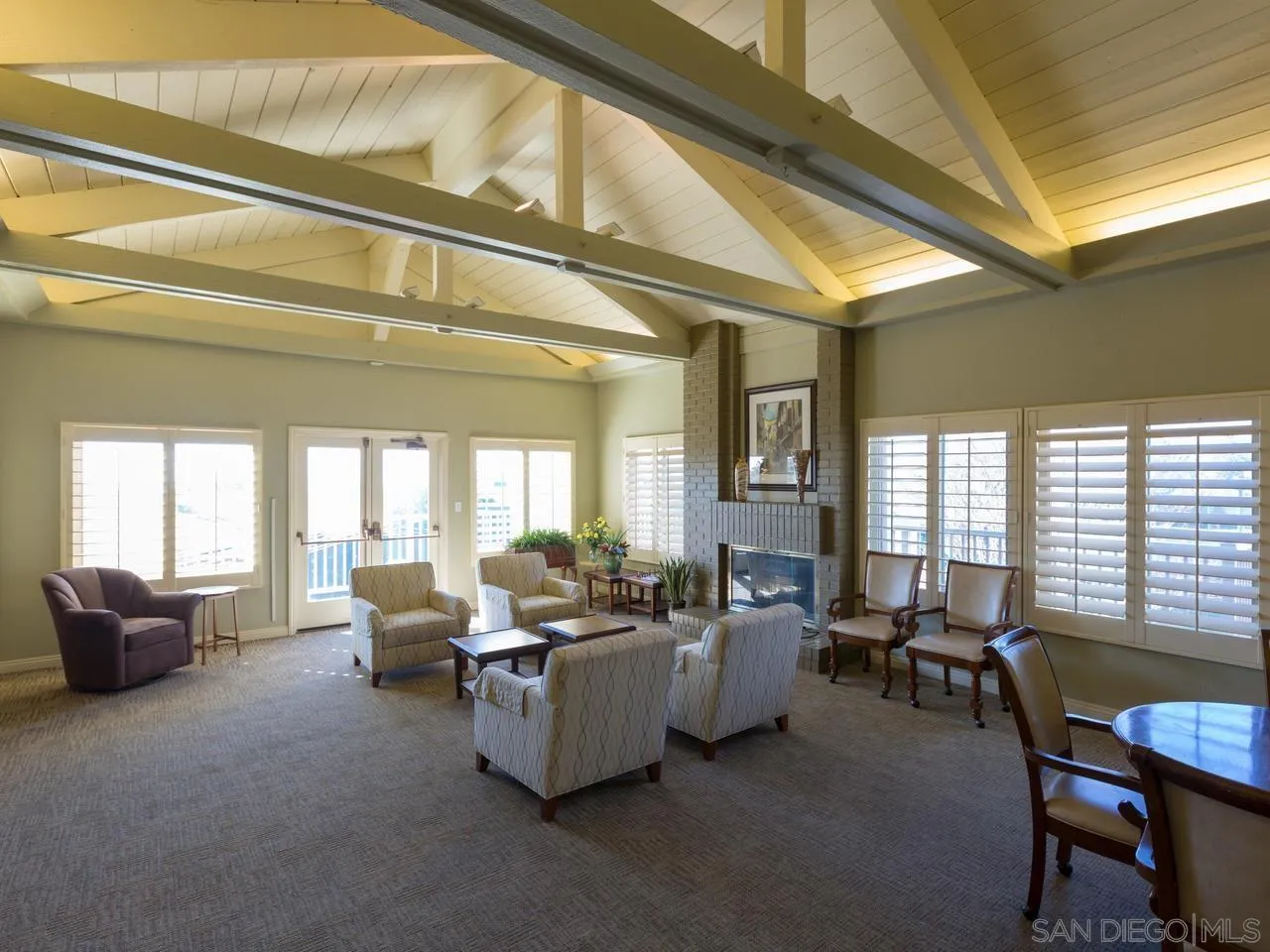 1804 Caminito Ascua La Jolla, CA 92037 - Photo 6 of 20 a living room with furniture and floor to ceiling windows