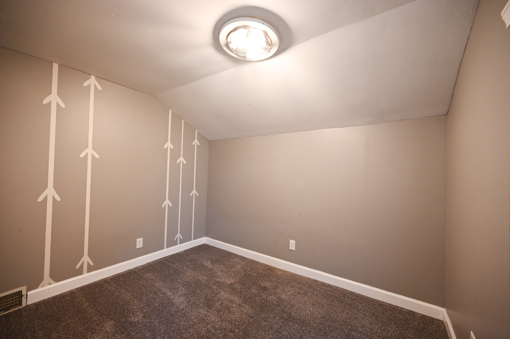 219 South 7th Street DeKalb, IL 60115 - Photo 23 of 30 an empty room with wooden floor and windows