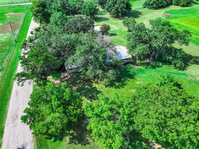 a view of a golf course with a garden