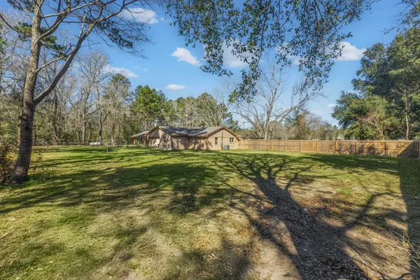 a view of a golf course with a yard