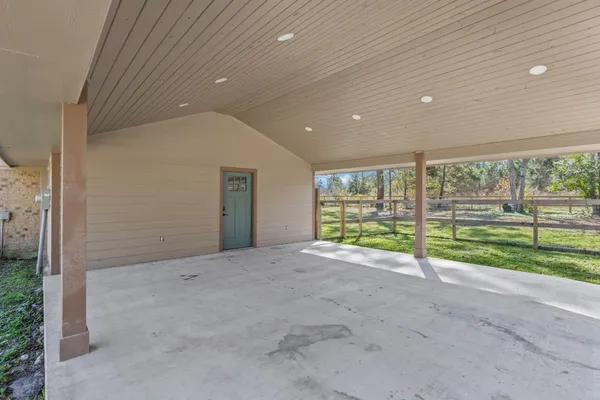 a view of an empty room with a sliding door