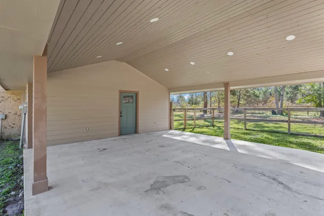a view of an empty room with a sliding door