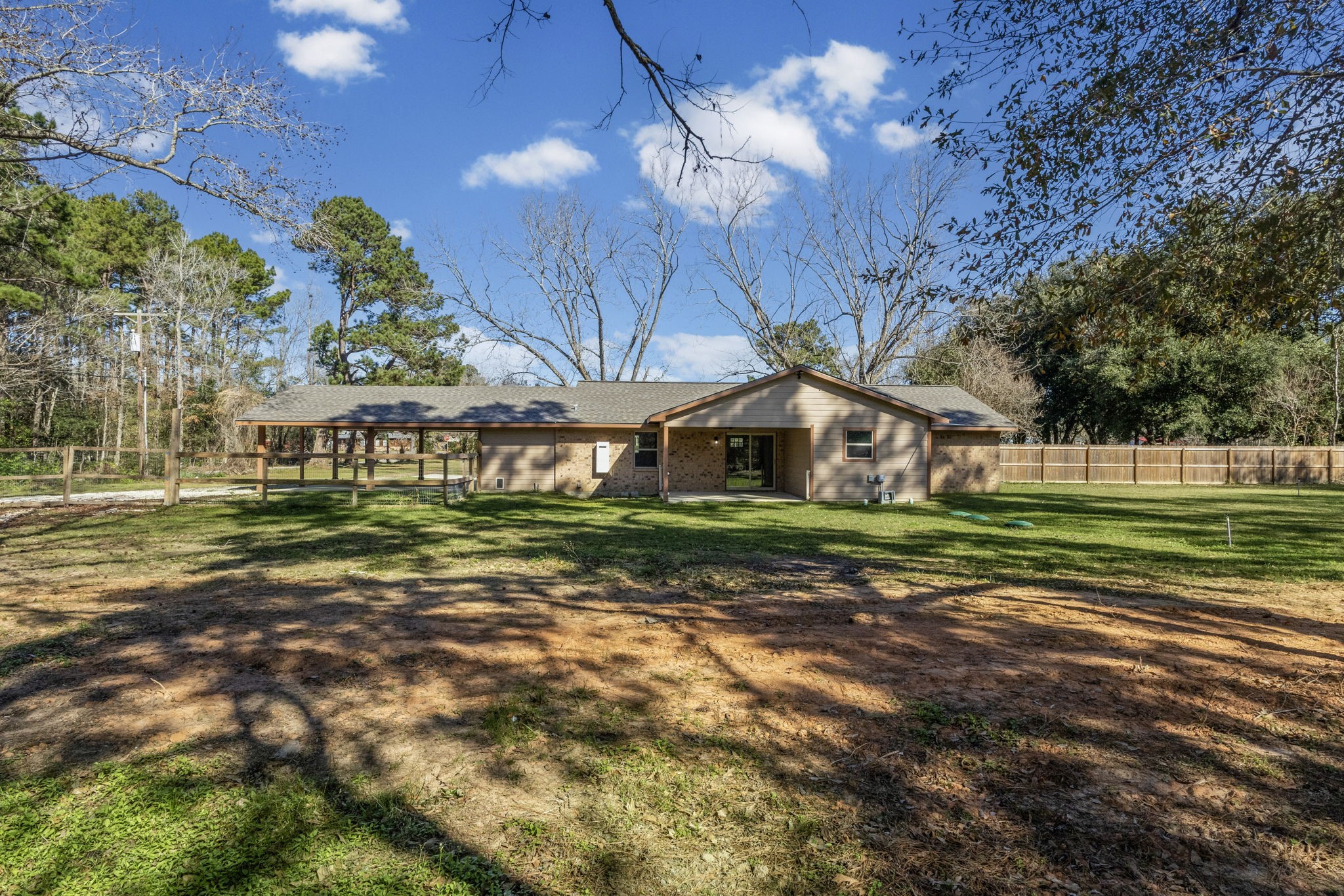 44271 Highway 105 Hull, TX 77564 - Photo 33 of 38 a view of a house with a yard
