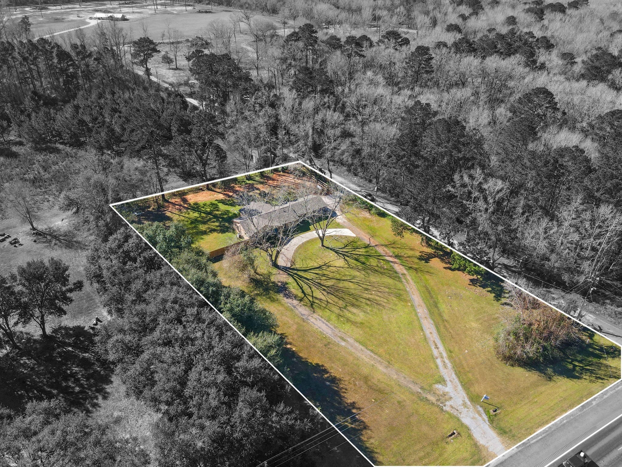 44271 Highway 105 Hull, TX 77564 - Photo 34 of 38 a view of a swimming pool with a yard