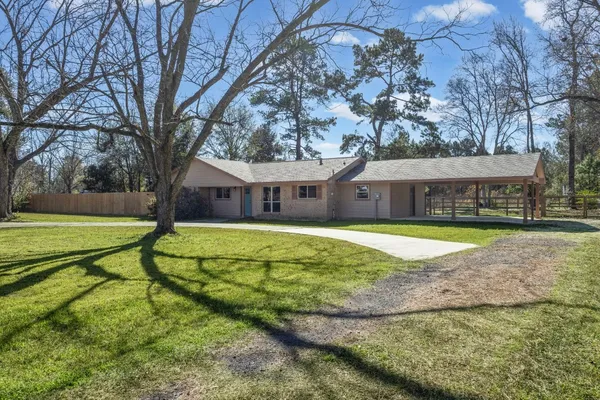 a house with swimming pool in front of it