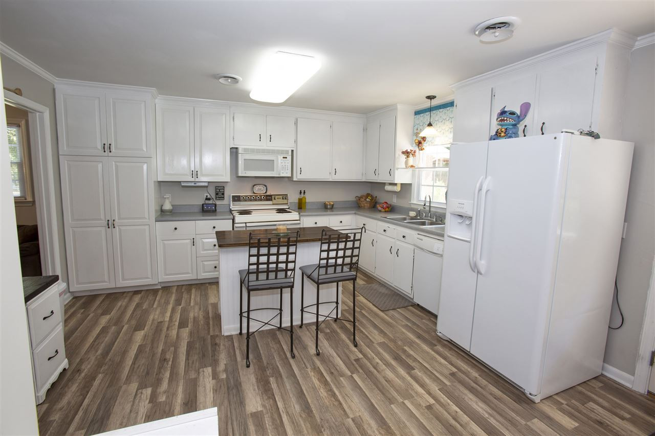 811 Lynn Road Durham, NC 27703 - Photo 8 of 18 Workspace works w/Kitchen plan
