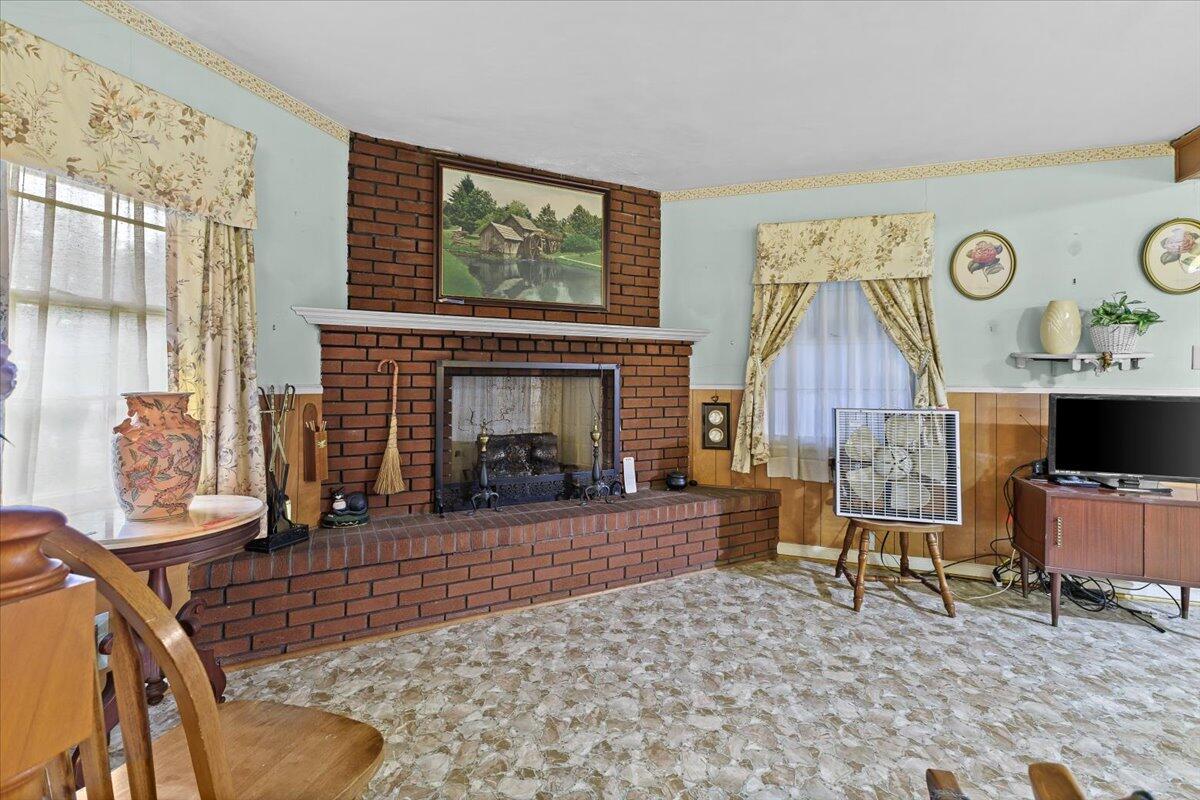 107 Frontier Road Northeast Roanoke, VA 24012 - Photo 8 of 25 Brick fireplace in Living Room