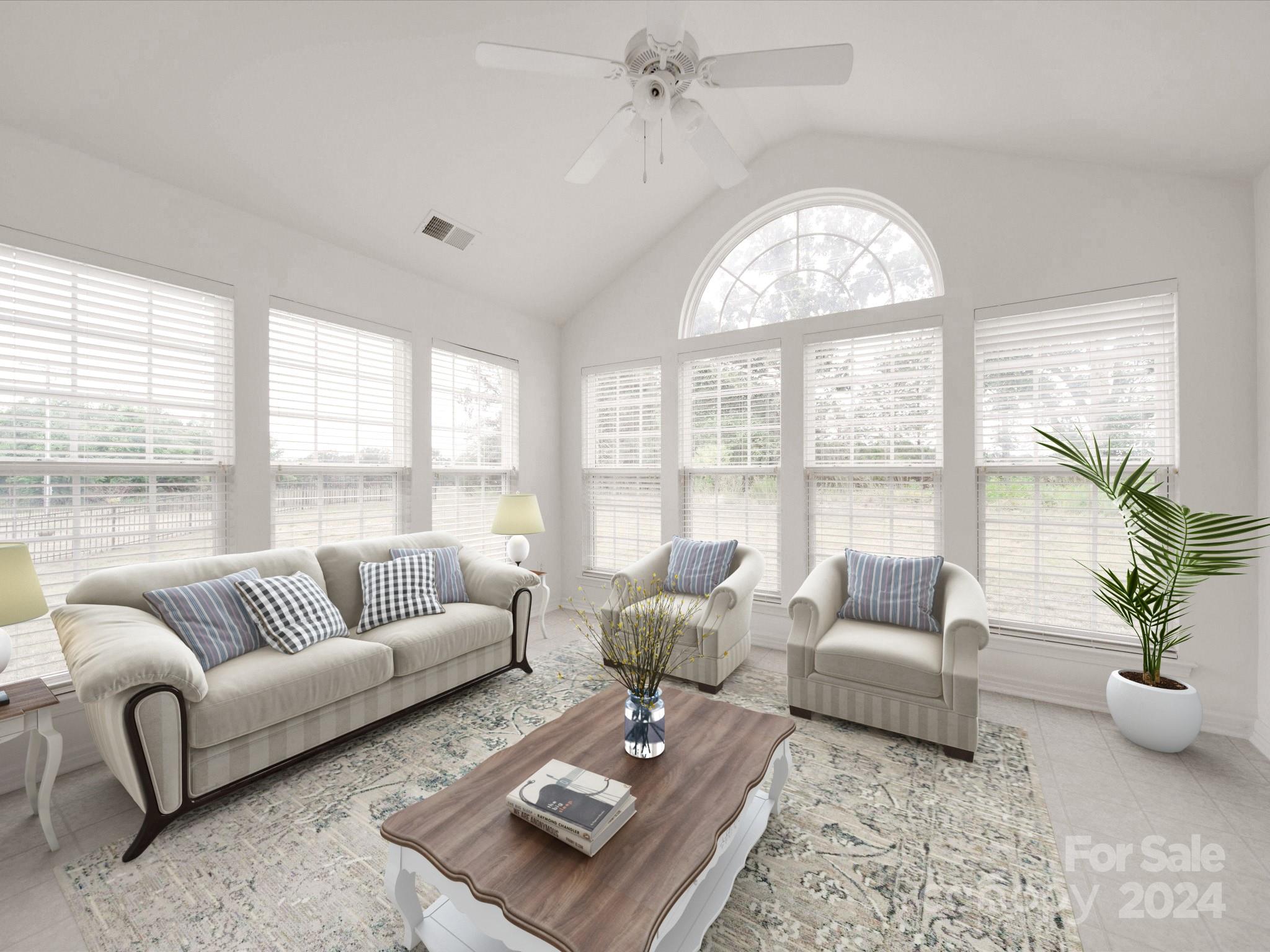 1004 Spanish Moss Road Indian Trail, NC 28079 - Photo 13 of 25 a living room with furniture and a large window