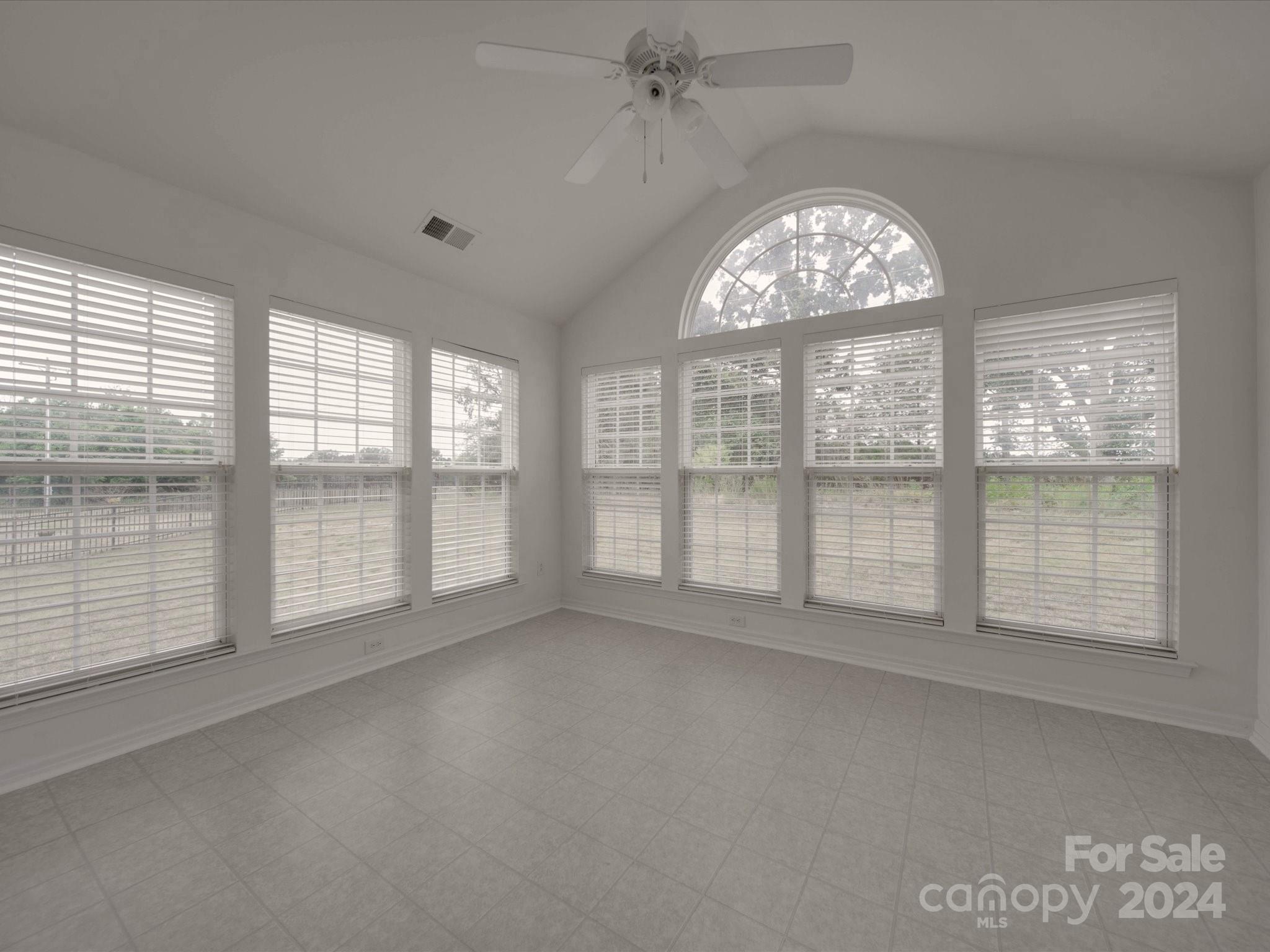 1004 Spanish Moss Road Indian Trail, NC 28079 - Photo 14 of 25 an empty room with large windows