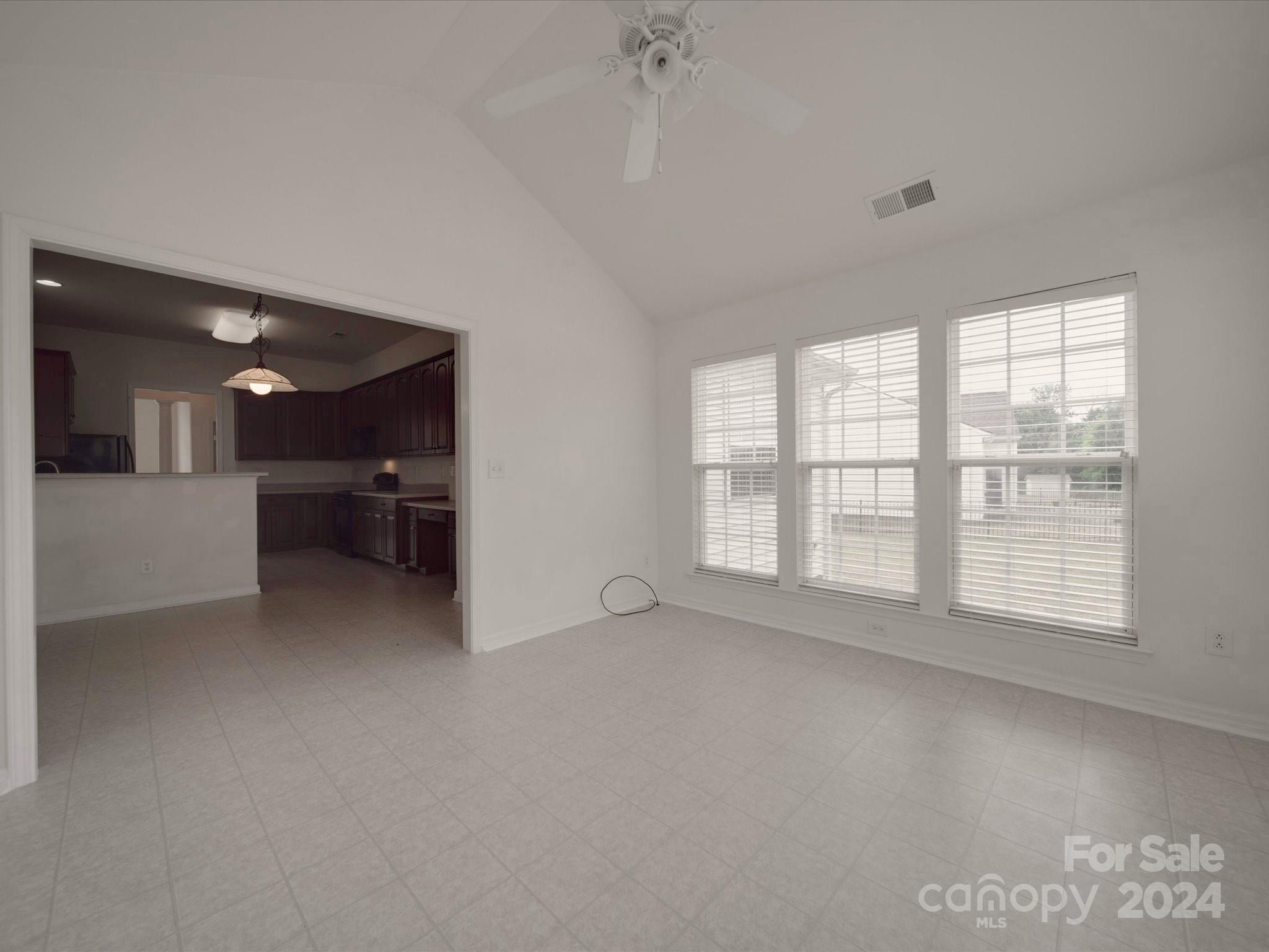 1004 Spanish Moss Road Indian Trail, NC 28079 - Photo 15 of 25 an empty room with furniture and a window