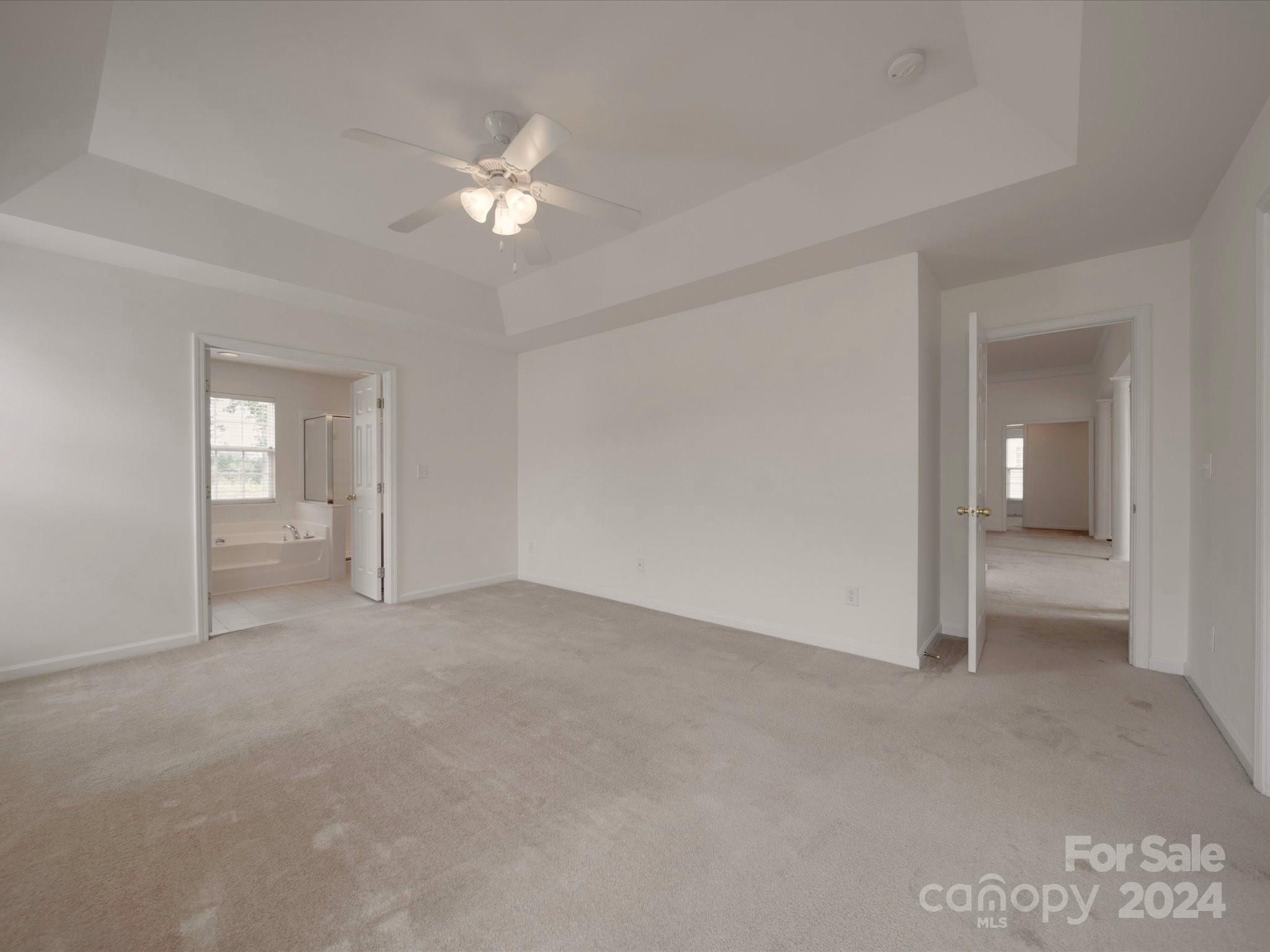 1004 Spanish Moss Road Indian Trail, NC 28079 - Photo 20 of 25 a view of an empty room with a window