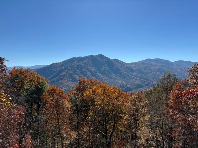 a view of mountains and valleys