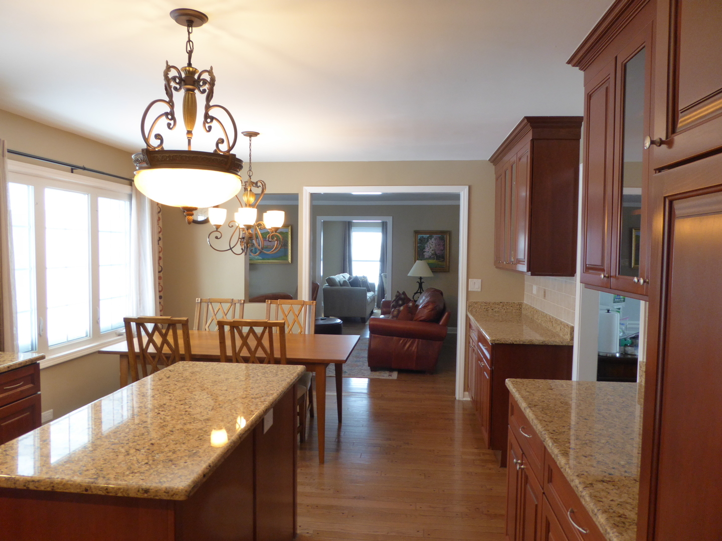 3324 Lake Knoll Drive Northbrook, IL 60062 - Photo 11 of 27 a living room with granite countertop furniture and a chandelier