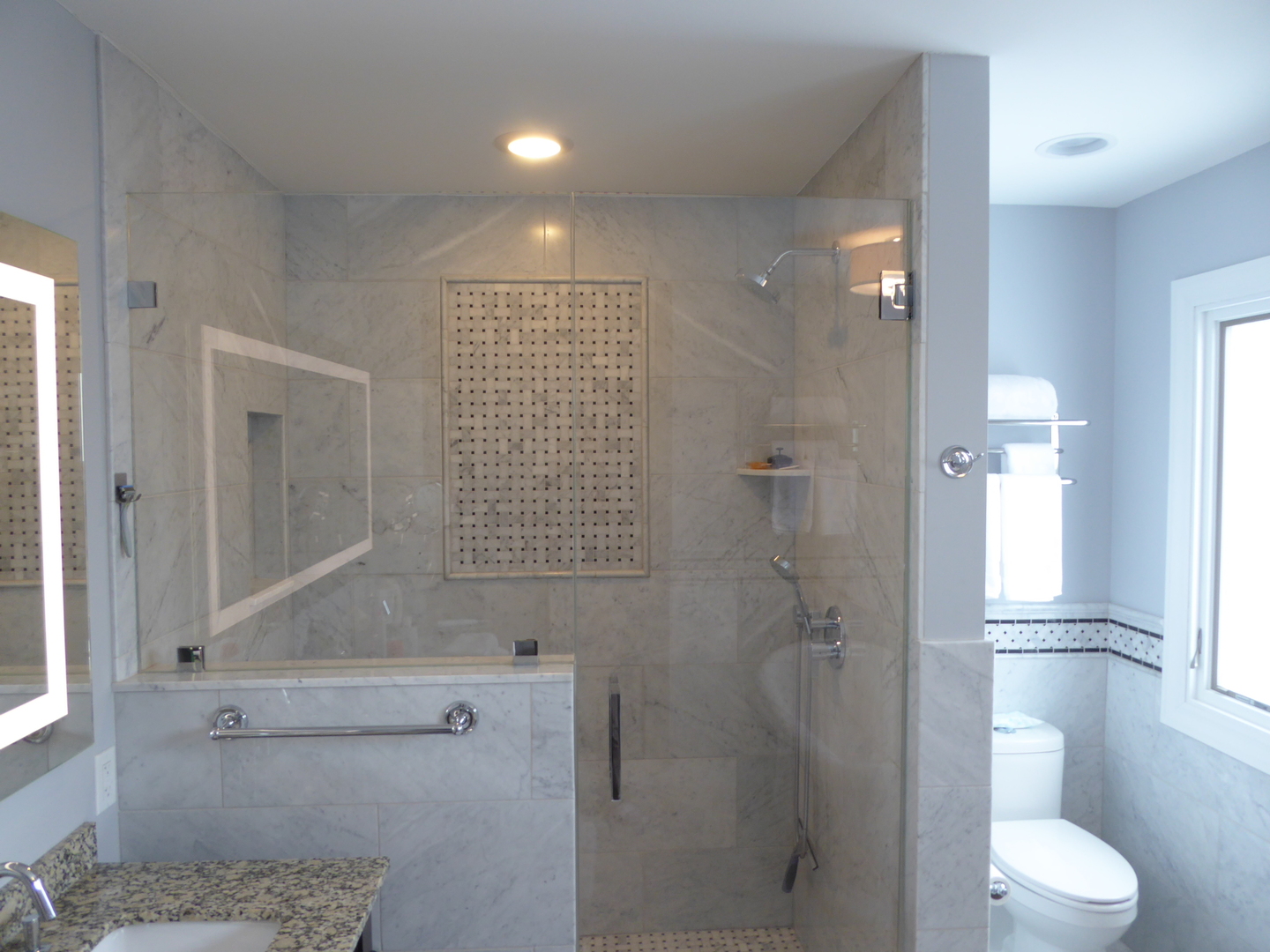 3324 Lake Knoll Drive Northbrook, IL 60062 - Photo 24 of 27 a bathroom with a shower and a toilet