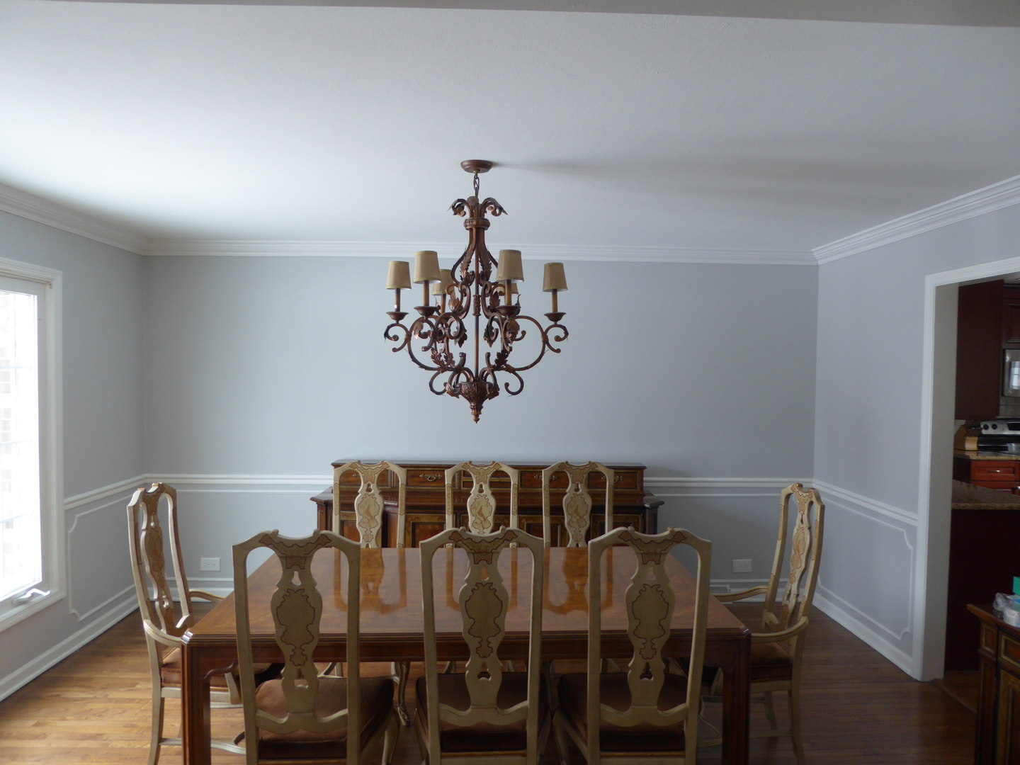 3324 Lake Knoll Drive Northbrook, IL 60062 - Photo 4 of 27 a view of a dining room with furniture and wooden floor