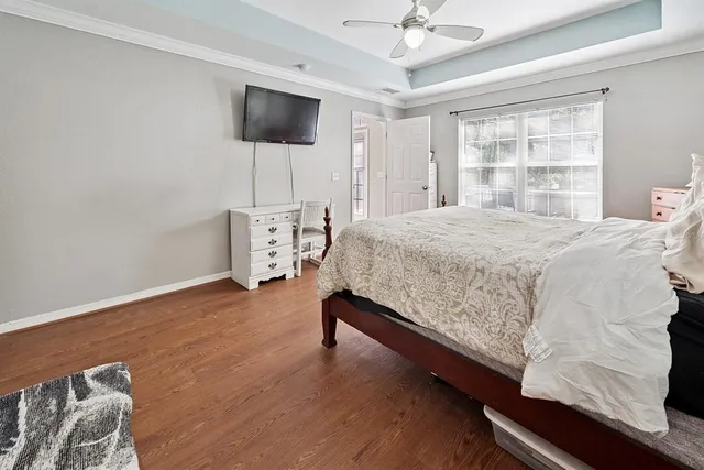 a spacious bathroom with a double vanity sink and a mirror