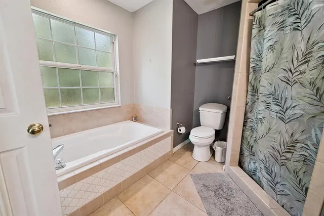 a view of a bedroom from a hallway