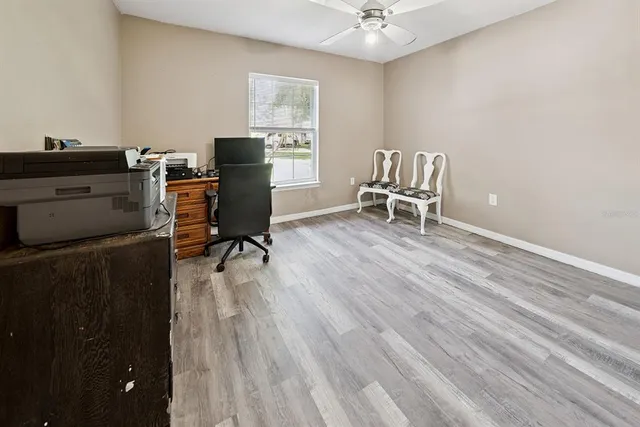 a bathroom with a sink toilet and mirror