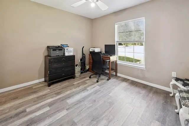 a bed room with a bed and a chandelier