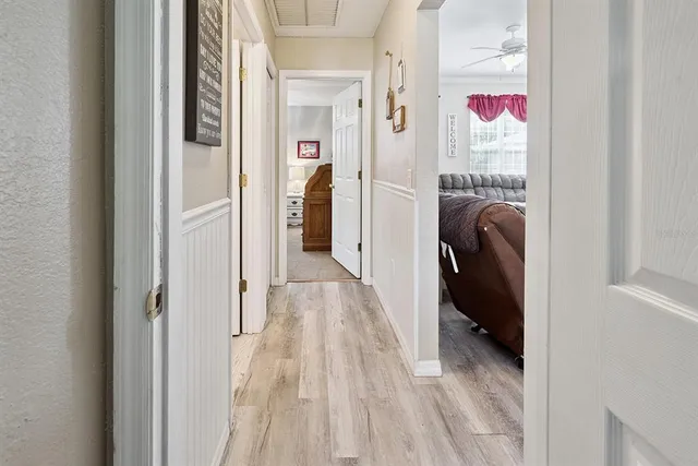 a bedroom with a bed and a view of bedroom