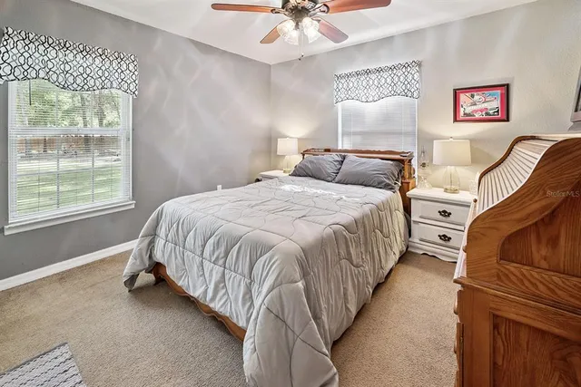 a view of a backyard with a tub and trees