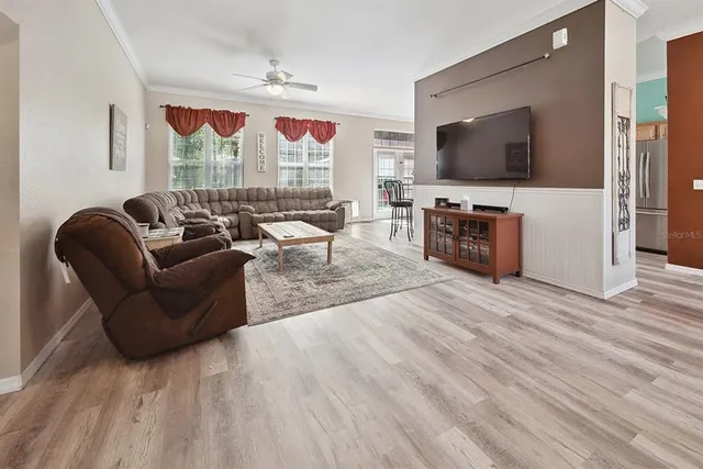 a living room with furniture and a window