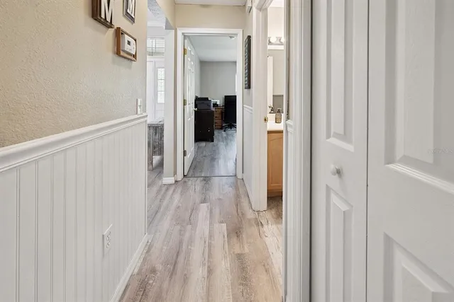 a backyard of a house with yard and outdoor seating
