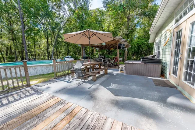 a backyard of a house with lots of green space
