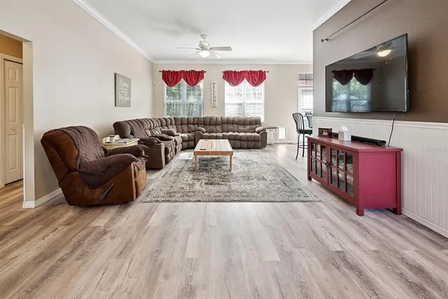 a living room with a couch and dresser