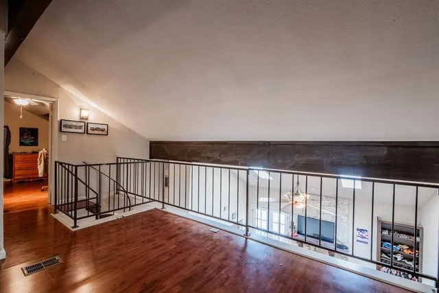a view of entryway with wooden floor