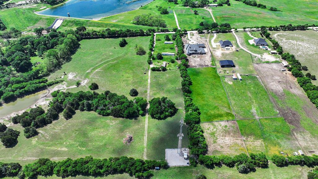 3291 Plainview Road Midlothian, TX 76065 - Photo 2 of 5 an aerial view of a residential houses with outdoor space and street view